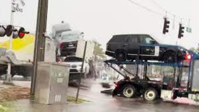 Breaking News Train Crashes into Stuck Car Hauler During Heavy Rain in Hollywood, Florida!