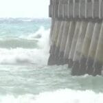 Fierce Winds Whip Lake Worth Beach - Tourists Brave the Storm!